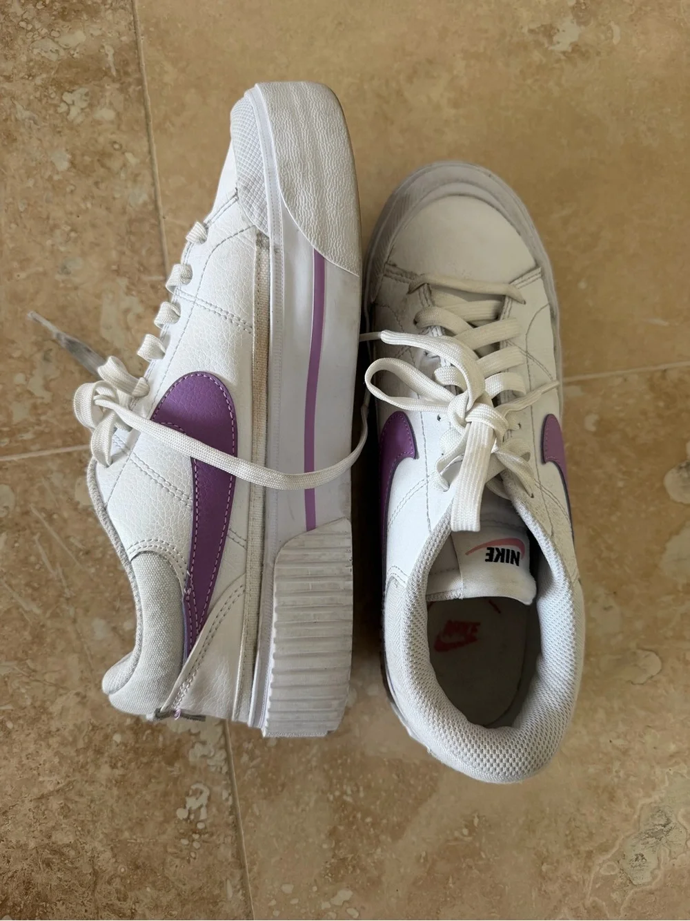 Nike Women’s White Low-Top Sneaker with Purple Swoosh Accent